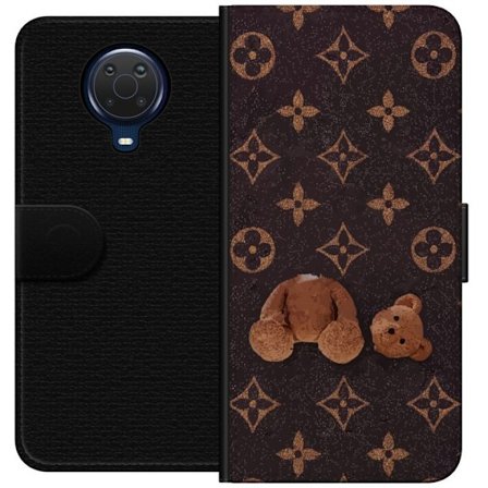 Kompatibelt Lommeboketui til Nokia Nokia G20 Grafiskt monogram mønster med en stilisert teddybjørn i en kunstnerisk stil