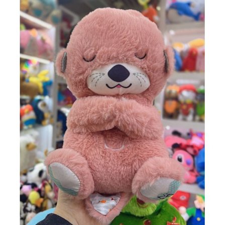 Åndedrætsbaby sovedyr, der beroliger babyottere og lader dem falde i søvn med musikalske dukker