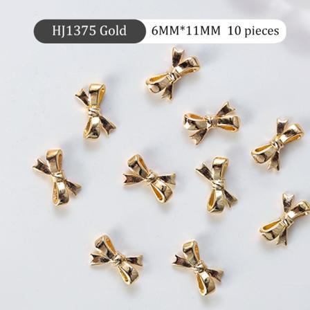 10 stk 3D mini metalbånd bowknot Nail Art Pearl Rhinestones D HJ1375
