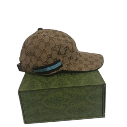 Gucci keps med GG-mönster och blå detalj