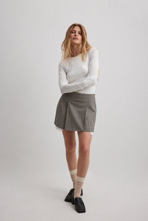 NA-KD Smått rutig plisserad minikjol - Plisserade kjolar - Rutig - EU 38