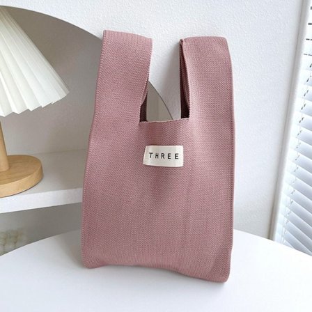 Stickad handväska Knot handledsväska 1 1