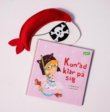 Konrad klär på sig - Bok av Åsa Mendel-Hartvig & Caroline Röstlund - Inbunden