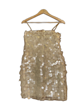 Cremefärgad paljettklänning