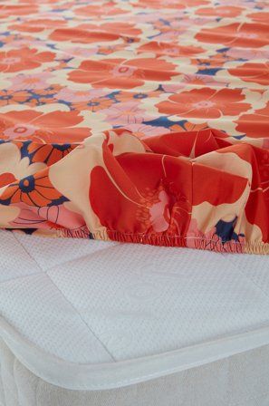 Jotex - Mini Stretchlaken Økologisk Oransje - FRIDA - Kjøp Laken hos Jotex