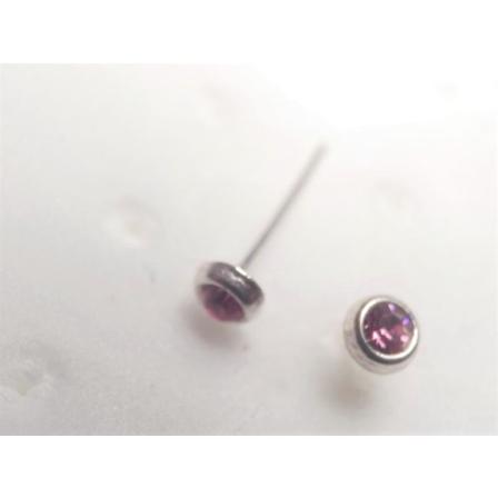 1 st. N spiercing i silver med infattade 2mm. rosa kristall