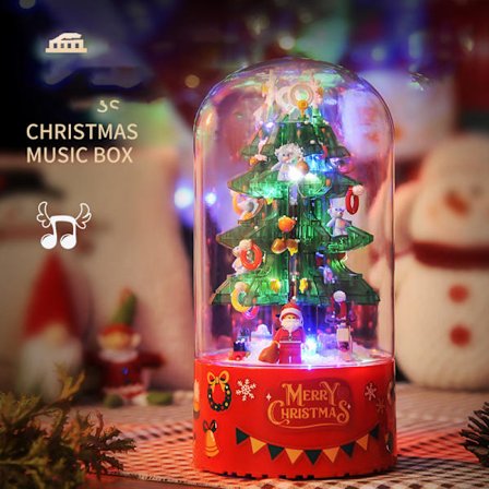 Kootut rakennuspalikat pyörivän musiikkilaatikon kanssa, opettavaisia rakennuspalikoita, lahjoja pojille ja tytöille