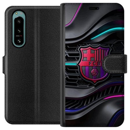 Kompatibelt Plånboksfodral till Sony Xperia 5 IV Futuristiskt FC Barcelona-emblem i neonfärger på mörk teknisk bakgrund med metalliska former och
