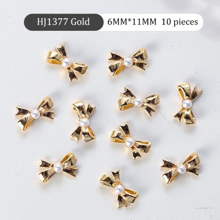 10 stk 3D mini metallbånd bowknot Nail Art Pearl Rhinestones D HJ1377