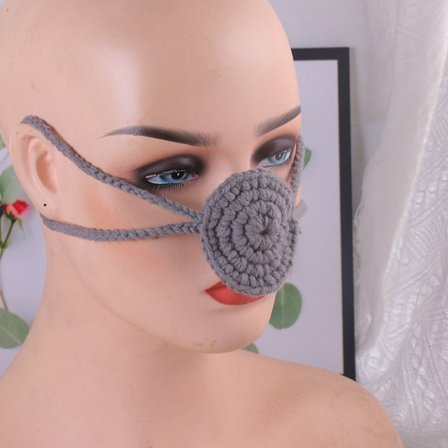 Håndlaget nesemaske i ull, pustende, komfortabel og varm, egnet for utendørsaktiviteter.