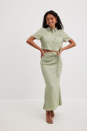NA-KD Boho Jupe mi-longue à découpes - Jupes mi-longues fendues - Vert - EU 34