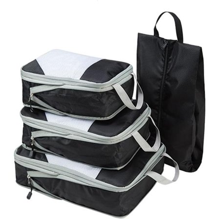 Sett med pakkekuber, kompresjonspakning og skopose for reise