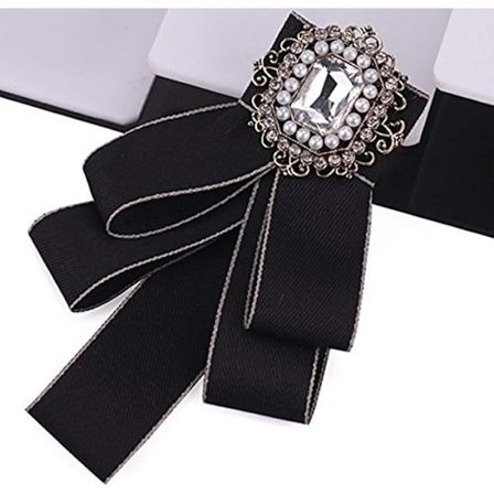 Slips med rosett och strassbrosch