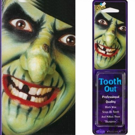 Tappad tand med svart vax