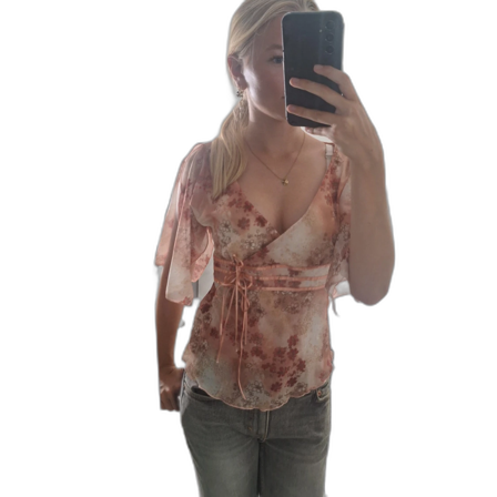 Blommig omlottblus med snörning