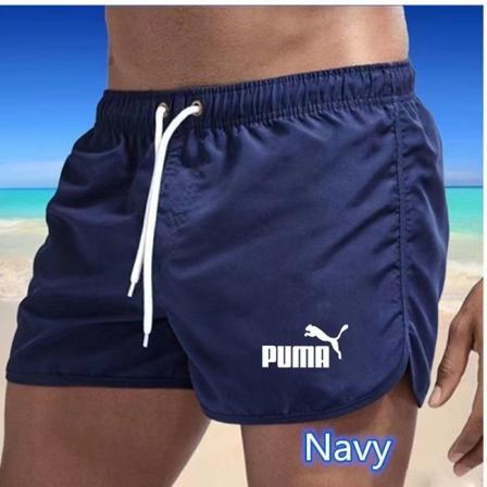 Flerfärgade sportshorts i strandpolyester med tre punkts puma Navy L
