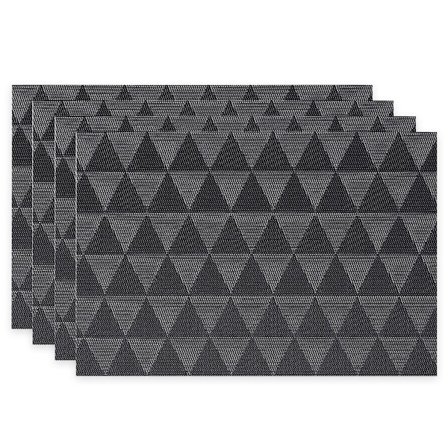 Et sæt med 4 vaskbare, varmebestandige og skridsikre PVC-dækkeservietter.