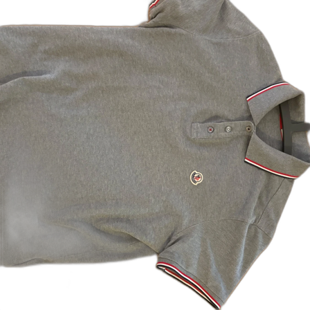 Grå pikétröja från Moncler