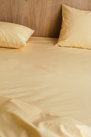 Jotex - Percale Faconsyet Lagen - Økologisk Smørgul - ZACK - Køb Faconsyede lagener hos Jotex