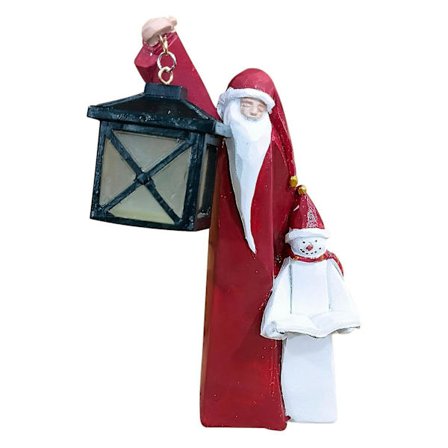 Juldekoration tomte och snögubbe inomhus och utomhus