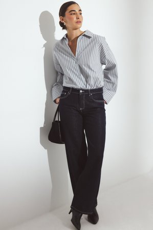 NA-KD Jean en denim souple à taille mi-haute - Jeans baggy - Bleu - EU 42