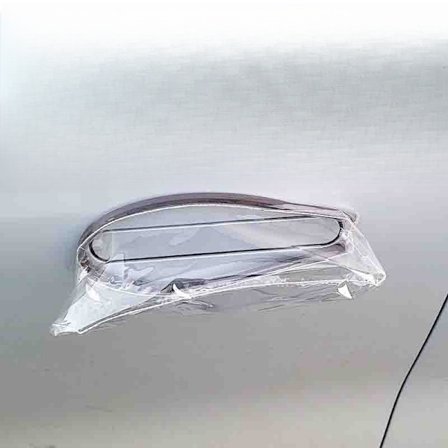 Auton ovenkahvan sadesuojat 1 pari