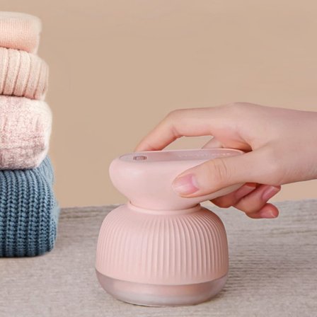 En flicka pulver ludd shaver, kläder ludd remover, tyg ludd sha