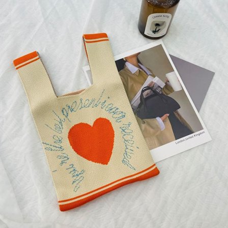 Stickad handväska Knot handledsväska S12 12