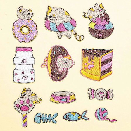 12 stk. broderi-klistremerker med tegneseriefigurer for stoff med selvklebende bakside