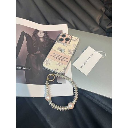 Skal för iPhone 16pro Metallring elektroplätering - ros + dubbla skalpärlor snodd Temperament kamelia läderarmband textur trend