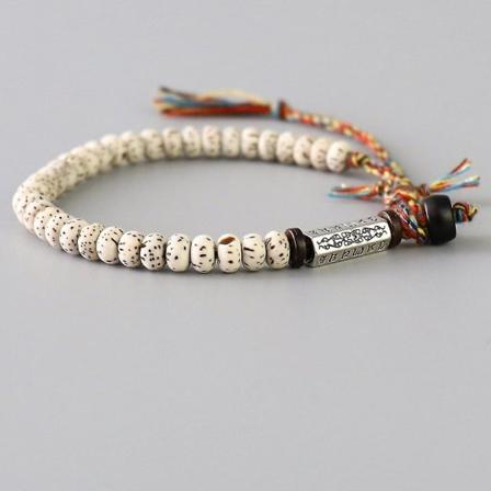 Klassisk tibetansk buddhistisk flettet tråd lykkeknude armbånd