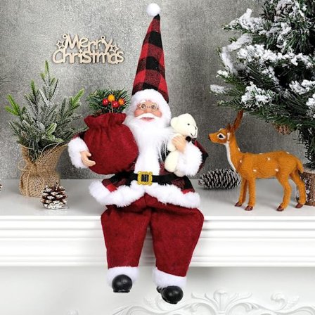 Håndlavet siddende julemand figur med gavepose og lille