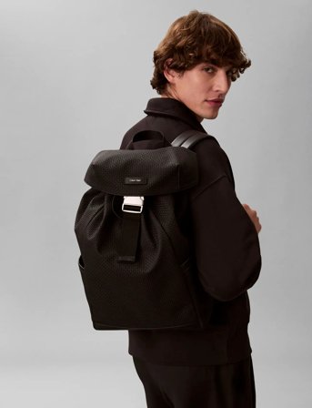 Calvin Klein Embossed Woven Flap Backpack - Black - ONE SIZE