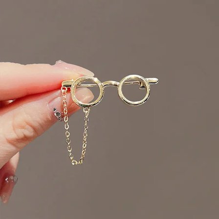 Vintage herkkä kevyt pyöreäkehys kultasävyinen metallinen silmälasinmuotoinen rintakoru koristeellisella riippuvalla ketjulla muotivaateasuste