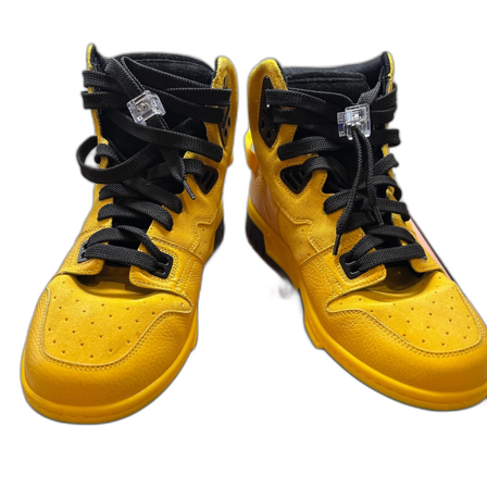 Gula sneakers med svarta detaljer