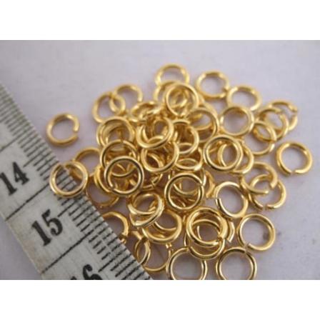 20 gr. ( Drygt 210 st) Guldpläterade motringar 6 mm. i diameter