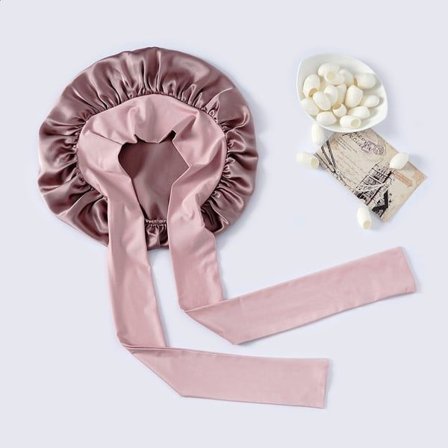 Sovehette, laget av 100% silke.