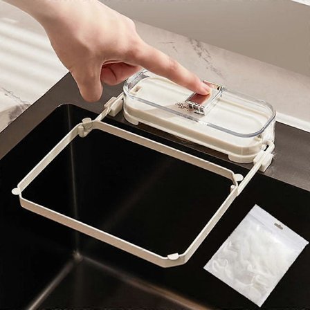 Imukupillinen tiskialtaan suodatinhylly, tiskialtaan viemärin siiviläkori, hyllyverkkopussin tyhjennyskori imukuppihyllyllä ja 100 