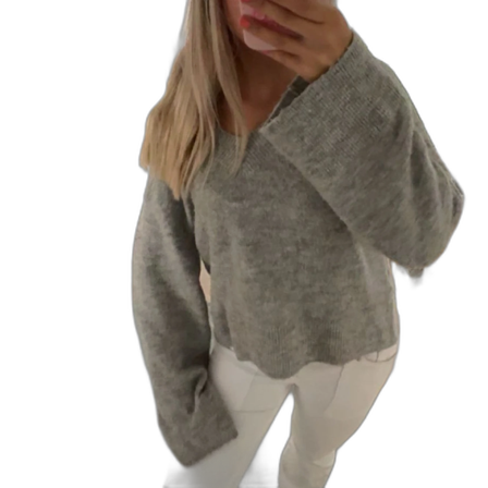 Grå stickad tröja med v-ringning