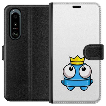Yhteensopiva Lompakkokotelo Sony Sony Xperia 5 III Sininen piirros hahmo kruunulla ja suurilla silmillä leikkisässä kuninkaallisessa tyylissä