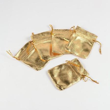 10 st. Guld organza påsar c.a 7x 9 cm.