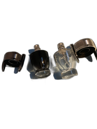 Två tomma mini invictus parfymer