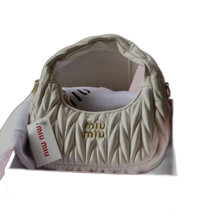 Vit quiltad handväska