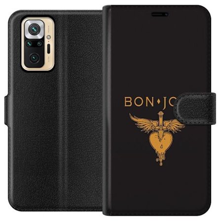 Kompatibelt Plånboksfodral till Xiaomi Redmi Note 10 Pro Ikonisk musikillustration med bevingat hjärta och dolk i guldtoner på mörk bakgrund, kraf