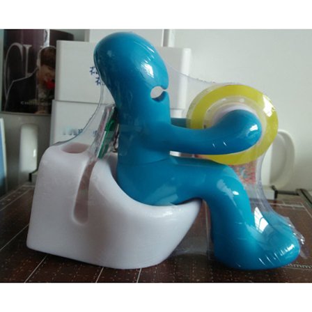 Blå tejpdispenser och kontorsmaterialstation i form av One Piece -