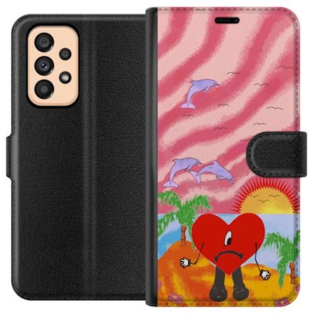 Kompatibelt Lommeboketui til Samsung Galaxy A53 5G Bad Bunny i en fargerik quiltet jakke med hjertemønster og solbriller i moderne gatestil