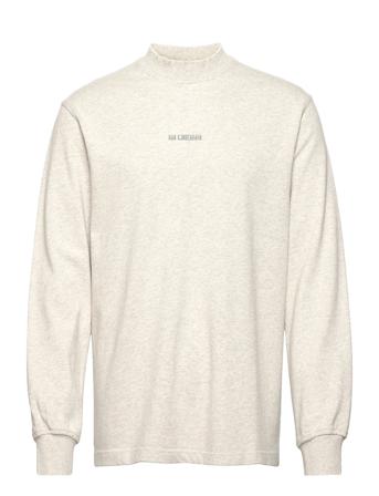 Distressed Tee Long Sleeve Logo T-shirts Long-sleeved Creme HAN Kjøbenhavn