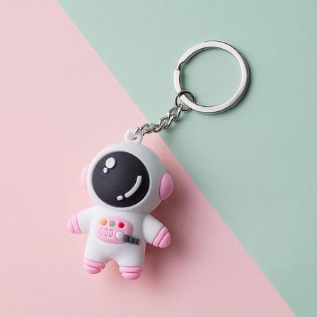 Söpö sarjakuva astronaut-avaimenperä Kannettava avaimenperä riipus reppuun käsilaukun lompakon koristeluun Pink A