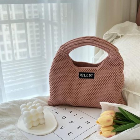 Stickad handväska Knot handledsväska ROSA pink