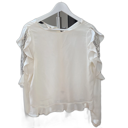 Vit volang blus med spets på skärmarna